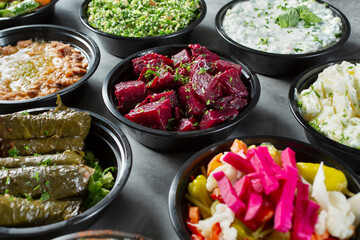 A view of a group of Mediterranean side dishes.