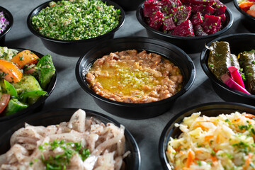 A view of several Mediterranean side dishes.