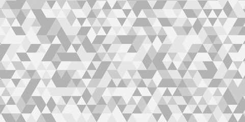Gray and white polygonal mosaic background. Seamless geometric pattern square shapes low polygon backdrop background.	

