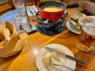 Typical Swiss cheese fondue as served in a traditional restaurant in Bern, capital of Switzerland. 
