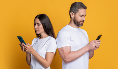 Modern phone communication. Woman and man blogging using smartphone. Messaging and texting. Connected online. Chatting on phone. Couple chat online. Family couple blogging. Digital hub