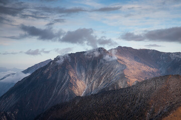 Obraz premium Looking at the magnificent scenery of Mount Balang in Sichuan Province, China from afar