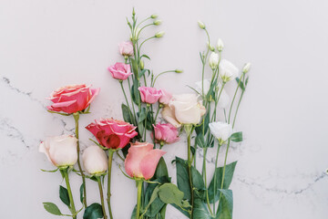 Assorted roses on marble, elegance in bloom