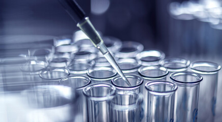 Biotechnology, Pipetting samples into test tubes for analysis