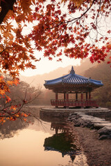 Red small ancient pavilion and red maple trees in small pond, Autumn scene of Naejangsan national park in South Korea.