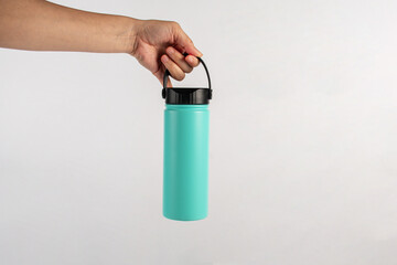 Hand holding cup cold storage. Tumbler glass cold store. on white background.