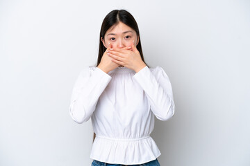 Young Chinese woman isolated on white background covering mouth with hands