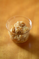 Nametake is a dish made with Enokitake mushrooms and cooked in soy sauce.