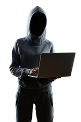 Silhouetted person in hoodie using laptop against a white background, concept of anonymity