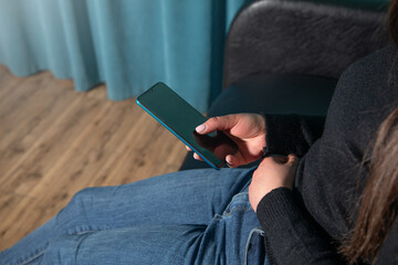 Caucasian woman using mobile phone.