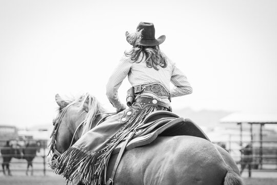 Cowgirl Riding In Rodeo Black and White