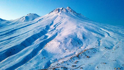 Foto op Canvas The scenic views of Hasan Mountain, which is a volcanic mountain with its 3268 meters peak, attracts the summit lovers with its majestic stance, Aksaray, Turkey © Selcuk