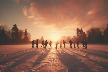 Rollo Friends ice skating on a frozen lake at sunset © Michael Böhm