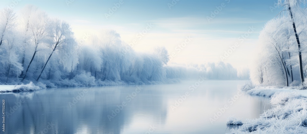 Poster a serene winter scene shows snowy trees lining the bank of a river, creating a picturesque view from
