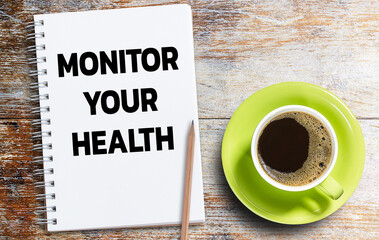 Business quotes, MONITOR YOUR HEALTH on notebook or paper in office desk, office workplace, inspiration, motivation quotes