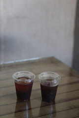 Closeup of Iced Caramel Macchiato at the coffee shop, Caramel Macchiato is a classic macchiato...