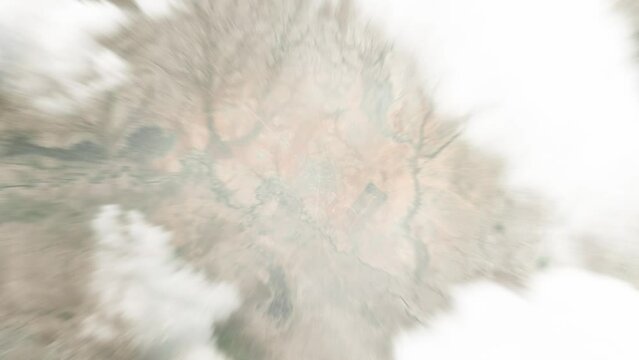 Earth zoom in from space to Gode, Ethiopia. Followed by zoom out through clouds and atmosphere into space. Satellite view. Travel intro. Images from NASA