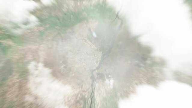 Earth zoom in from space to Juba, South Sudan. Followed by zoom out through clouds and atmosphere into space. Satellite view. Travel intro. Images from NASA