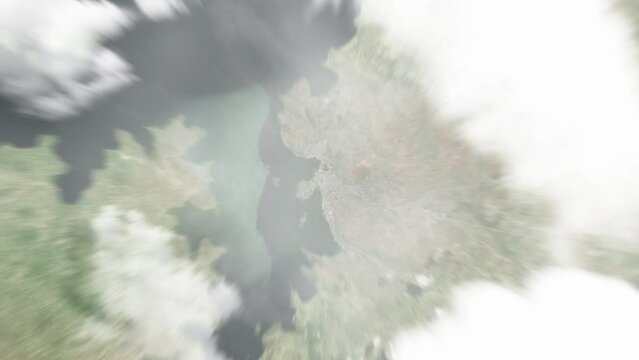 Earth zoom in from space to Mwanza, Tanzania. Followed by zoom out through clouds and atmosphere into space. Satellite view. Travel intro. Images from NASA