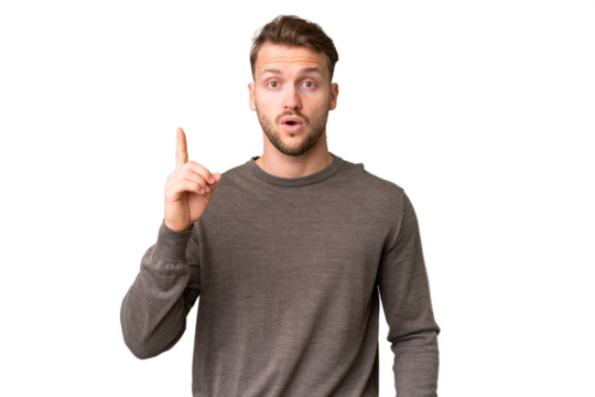 Young handsome caucasian man over isolated chroma key background intending to realizes the solution while lifting a finger up