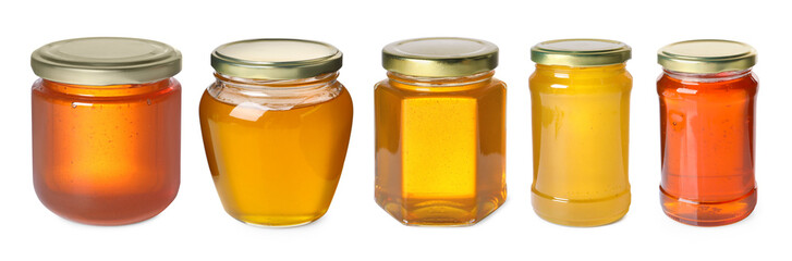 Natural honey in glass jars isolated on white, set
