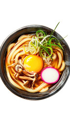 Udon soup with an egg, pink turnip slices and green onions on a white background, top view