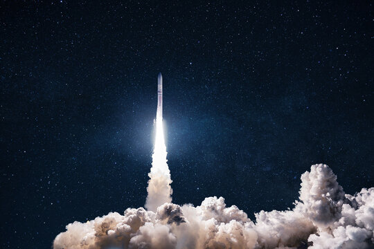 Spaceship takes off into the starry sky. Rocket starts into space. Concept. Launch successful. Taking off to the moon