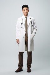 Asian doctor in white coat and brown pants