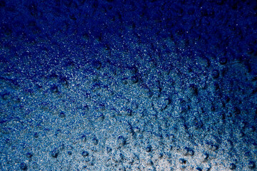 Blue and white colored abstract wall background with textures of different shades of blue