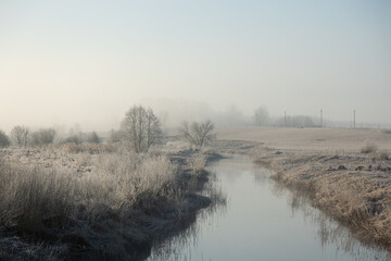 A beautiful early spring landscape with a river. Natural rural scenery of Northern Europe. - 771390413