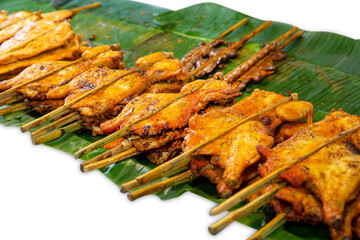 Top view of Grilled chicken on banana leaves, focus selective