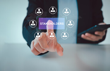 Stakeholders concept. Person touching stakeholders icon on virtual screen for business finance stakeholder investment management. Different stakeholders contact collaboration for company organization 