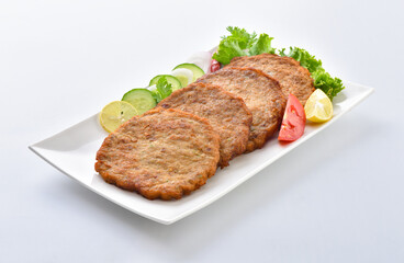 Chicken Chapli kebab or chapli kabab is a Pashtun-style minced kebab, usually made from ground beef, mutton or chicken with various spices in the shape of a patty. 