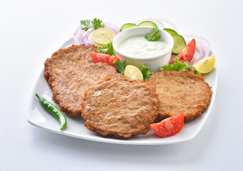 Chicken Chapli kebab or chapli kabab is a Pashtun-style minced kebab, usually made from ground beef, mutton or chicken with various spices in the shape of a patty. 