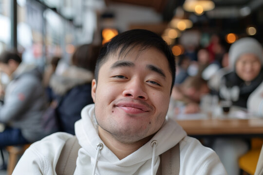 Guy with Down syndrome in a restaurant