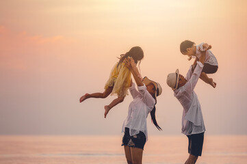 beach, children, childhood, sea, silhouette, together, friendship, parent, freedom, relax. A family...