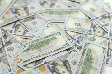 Banknotes of 100 American dollars top view, close-up.