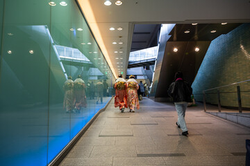 Osaka, Japan, January 8, 2024: Back view of woman wearing kimono, traditional Japanese clothing.