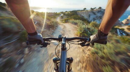 Cyclist POV on Coastal Trail at Sunset - obrazy, fototapety, plakaty