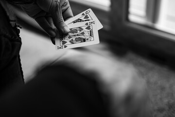 person holding poker cards