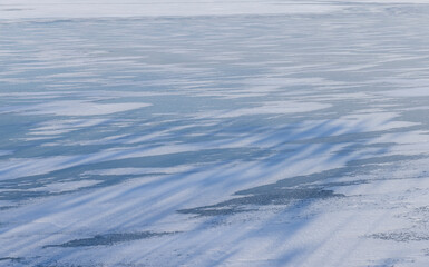 sunny winter weather on a frozen lake