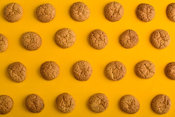 Cookies pattern on the yellow background - 771491638