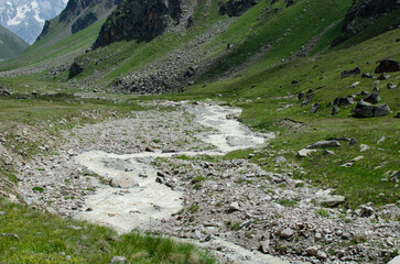 a mountain river flowing down a mountain gorge.a stormy water flow.