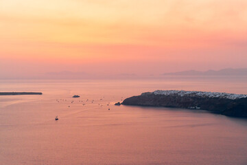 Sunset over Imerovigli near Thira town and Firostefani. Santorini, Cyclades Islands, Greece. 