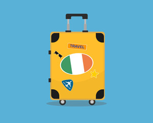 Suitcase or baggage with Ireland flag, holiday and vacation idea
