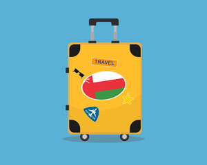Suitcase or baggage with Oman flag, holiday and vacation idea