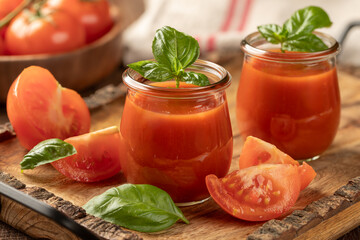 Tomato juice with basil leaves and sliced tomatoes - 771504051