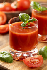 Tomato juice with basil leaves and sliced tomatoes - 771504226