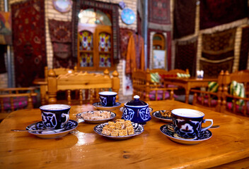 Traditional Uzbek tea with  sweets in coffee house at Bukhara - 771504491