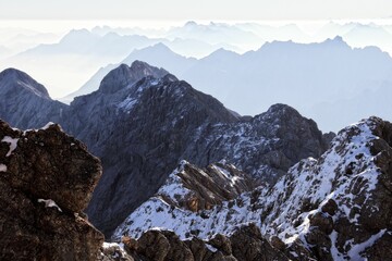 Scenic landscape of the Bavarian Alps in Germany blanketed in a layer of fresh, white snow